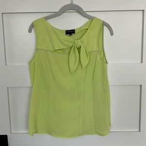 Nanette Lenore side zip sleeveless green blouse. NEVER WORN.